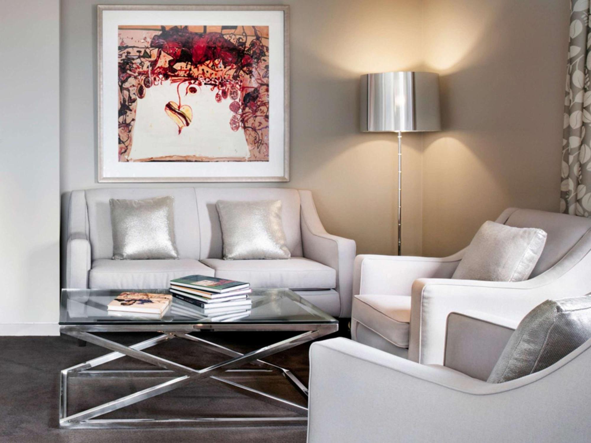 The Olsen Melbourne Art Series Экстерьер фото A living room with a floor lamp